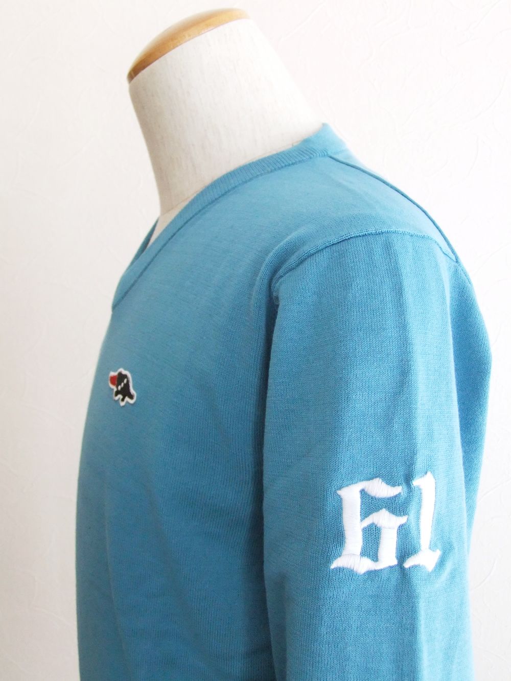 FAIRWAY FEVER V- NECK   ロゴ入りVネックセーター (ターコイズ) RSM-22087