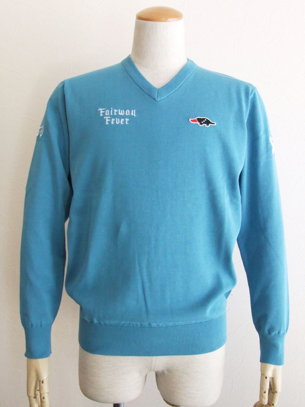 FAIRWAY FEVER V- NECK   ロゴ入りVネックセーター (ターコイズ) RSM-22087