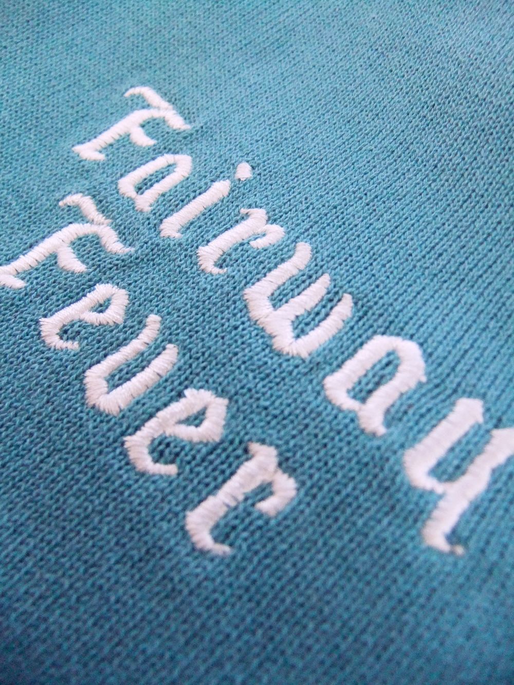 【LADIES】 FAIRWAY FEVER VEST W.   ロゴ入り ニットベスト (ターコイズ) RSL-22037