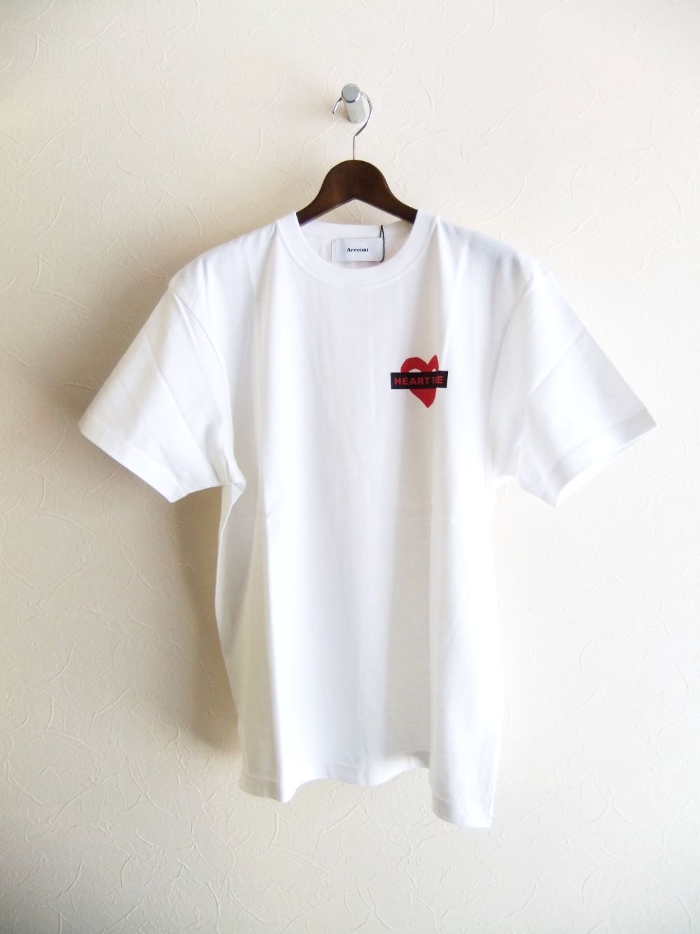 【MICALLE MICALLE Account】 HOMMAGE  HEART FACE T-SHIRT  (ホワイト)   ロゴ T-SHIRT   MAB107TCA