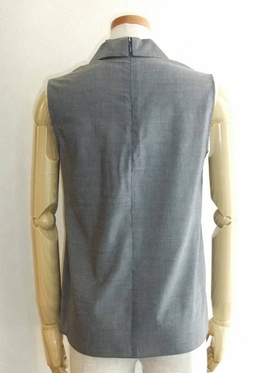 NO SLEEVE FRILL BLOUSE