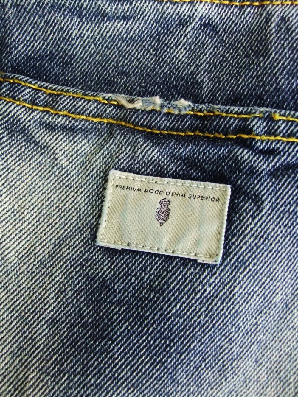 DAMAGE JEANS