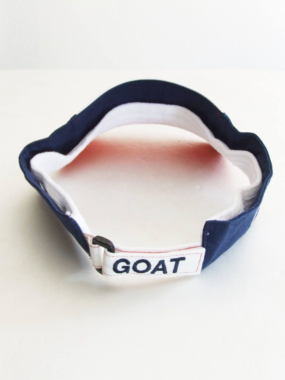 WORLD TOUR VISOR ( ORANGE × NAVY ) ロゴ入りバイザー