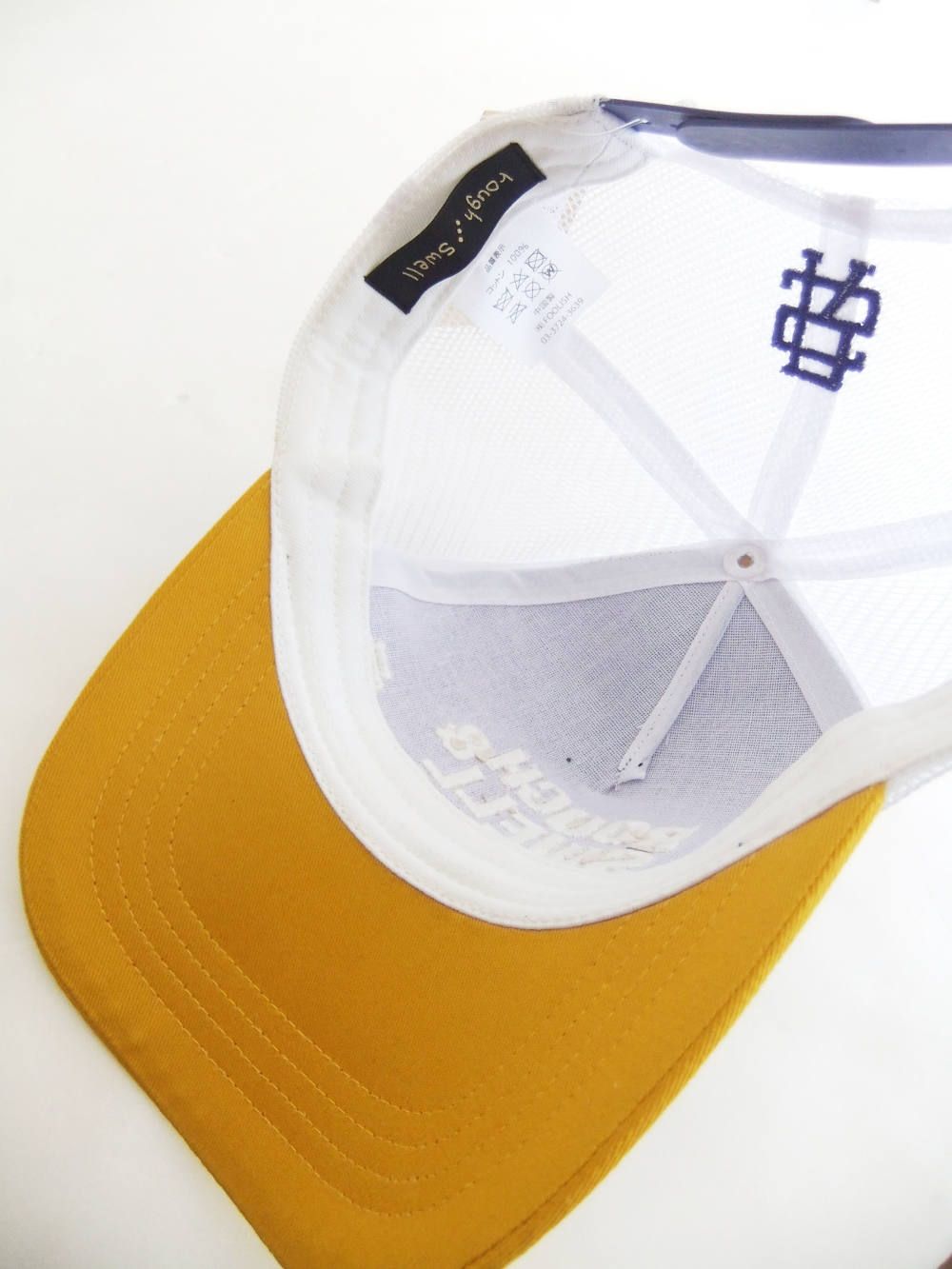 TRUCKER CAP ( パープル × イエロー ) ロゴ入りキャップ