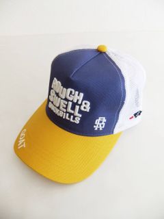 TRUCKER CAP ( パープル × イエロー ) ロゴ入りキャップ