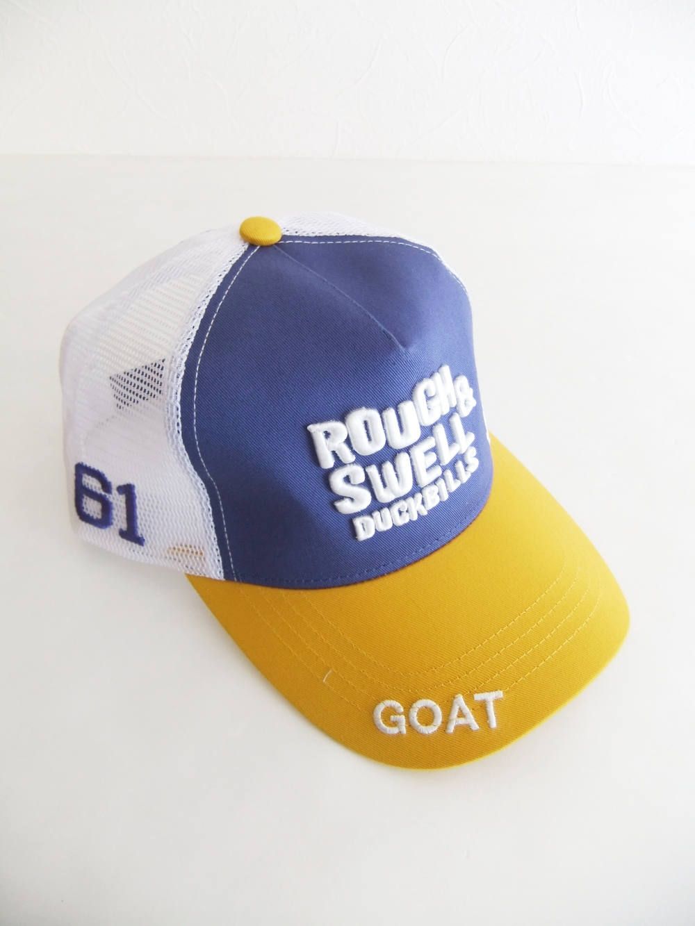 TRUCKER CAP ( パープル × イエロー ) ロゴ入りキャップ