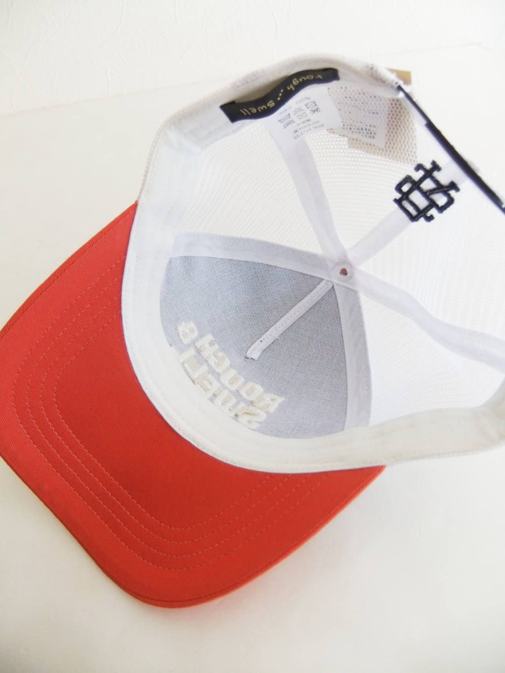 TRUCKER CAP ( ネイビー × オレンジ ) ロゴ入りキャップ