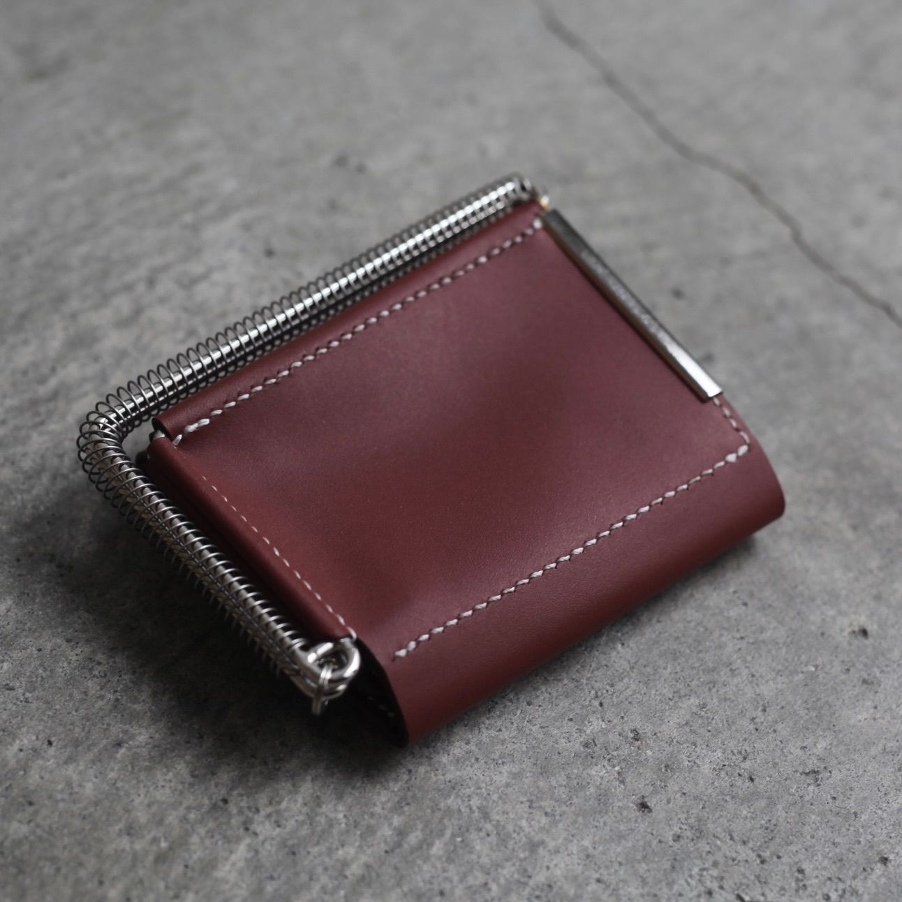 【残り一点】Coil Spring Trifold Wallet(HOOKE_COW)