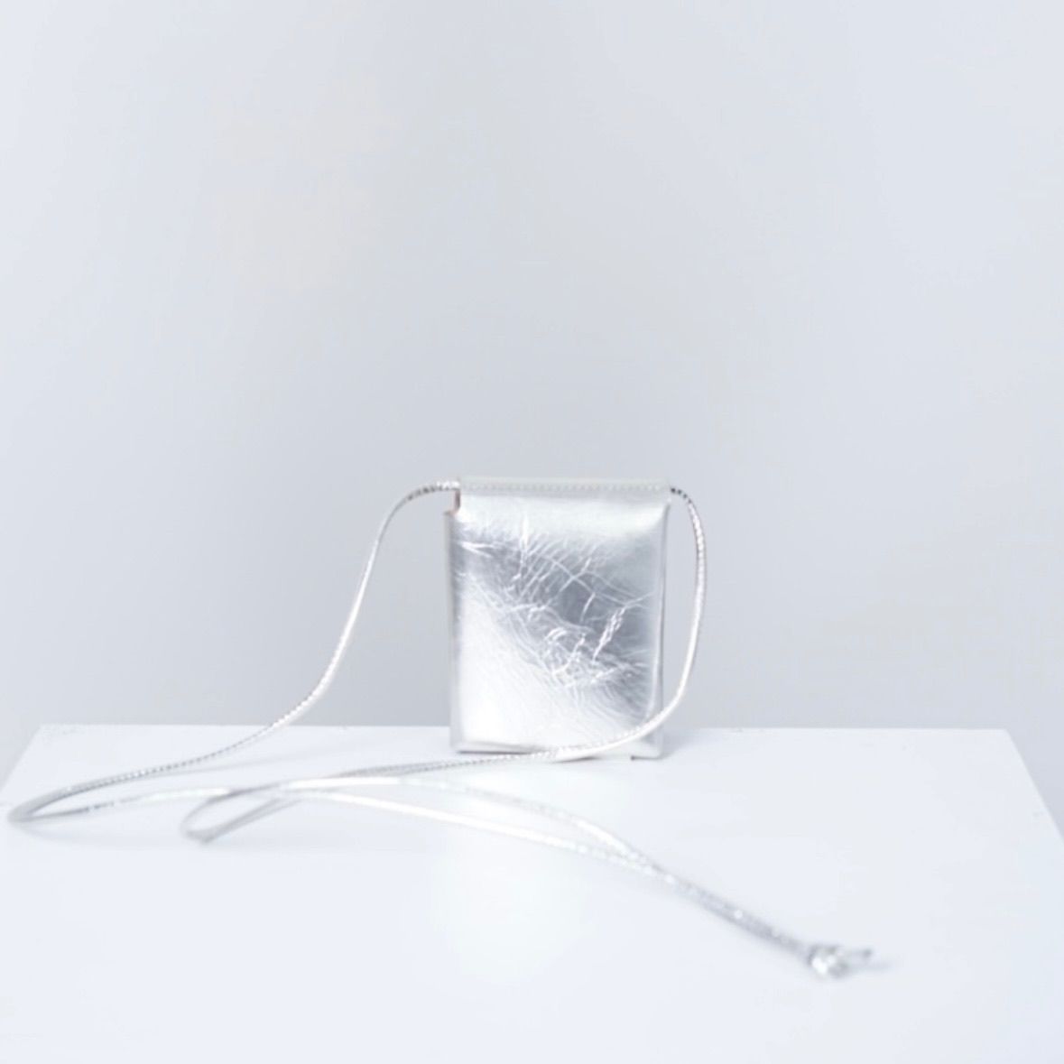 MARROW - 【残りわずか】Metallic String Purse | ACRMTSM ONLINE STORE