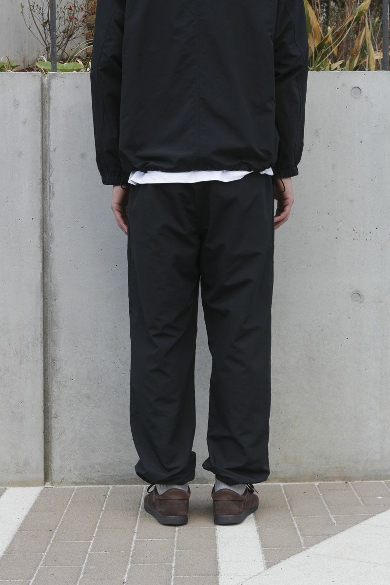 UNIVERSAL PRODUCTS - ナイロン トラック パンツ - NYLON TRACK PANTS