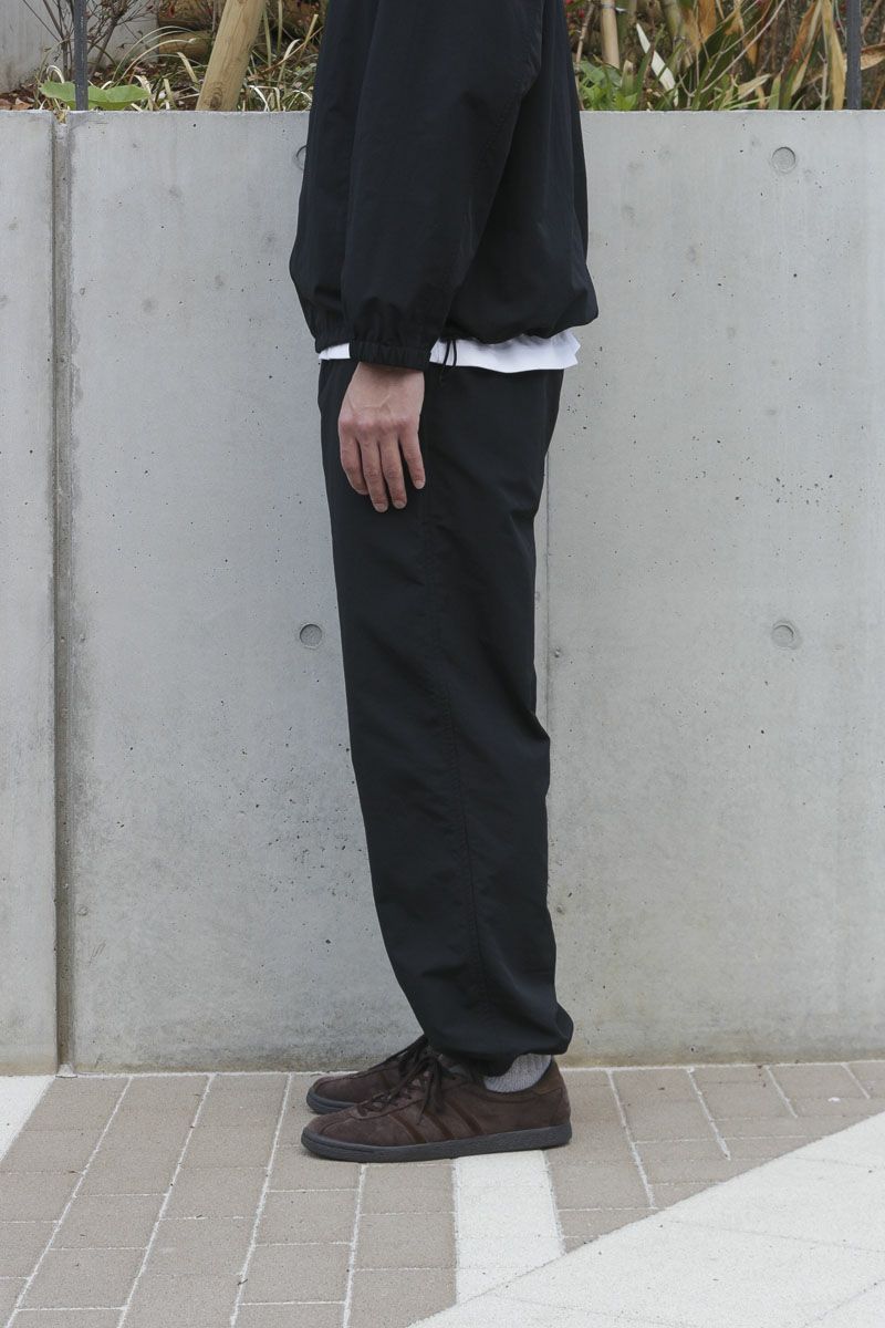 UNIVERSAL PRODUCTS - ナイロン トラック パンツ - NYLON TRACK PANTS