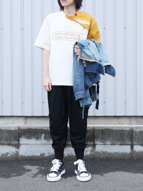 アイコニックなメゾンミハラヤスヒロのダメージデニムスタイル