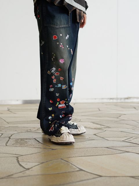 グラフィックデニムが主役の MMY26SS ストリートスタイル