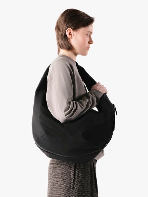Reno Carbon Black 21L - ハイブリッドショルダーバッグ(ウェアラブルベスト)