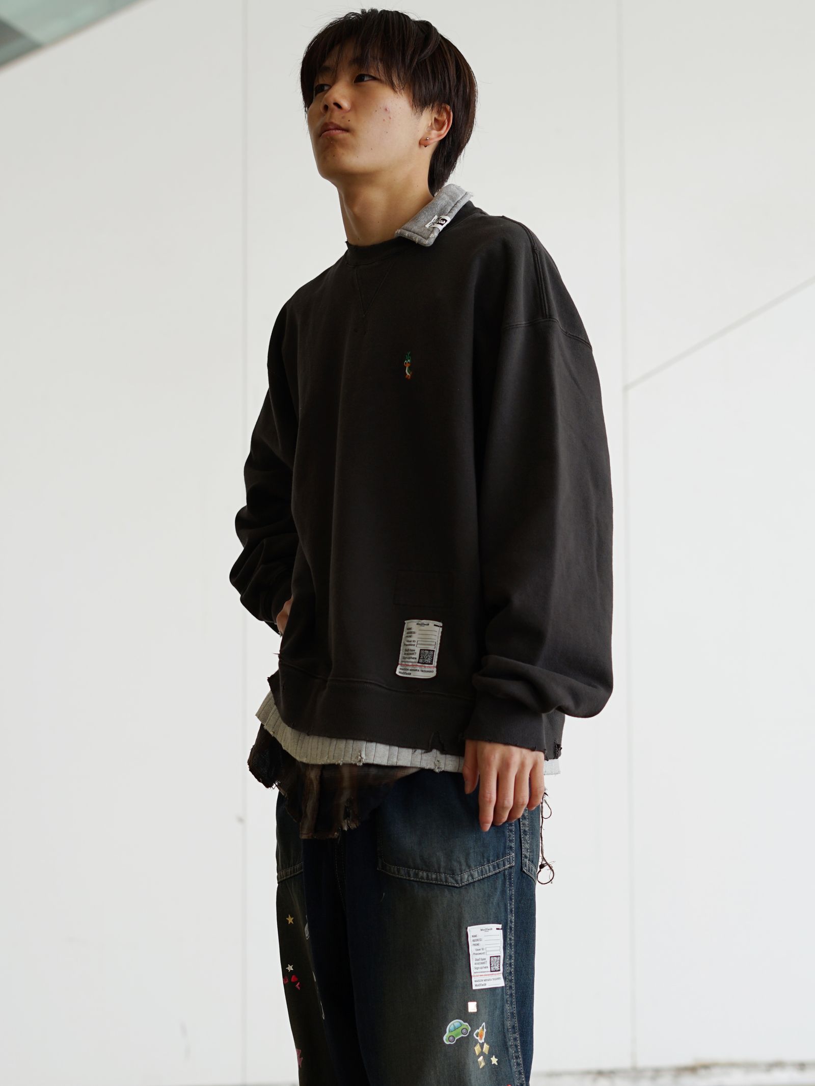 グラフィックデニムが主役の MMY26SS ストリートスタイル