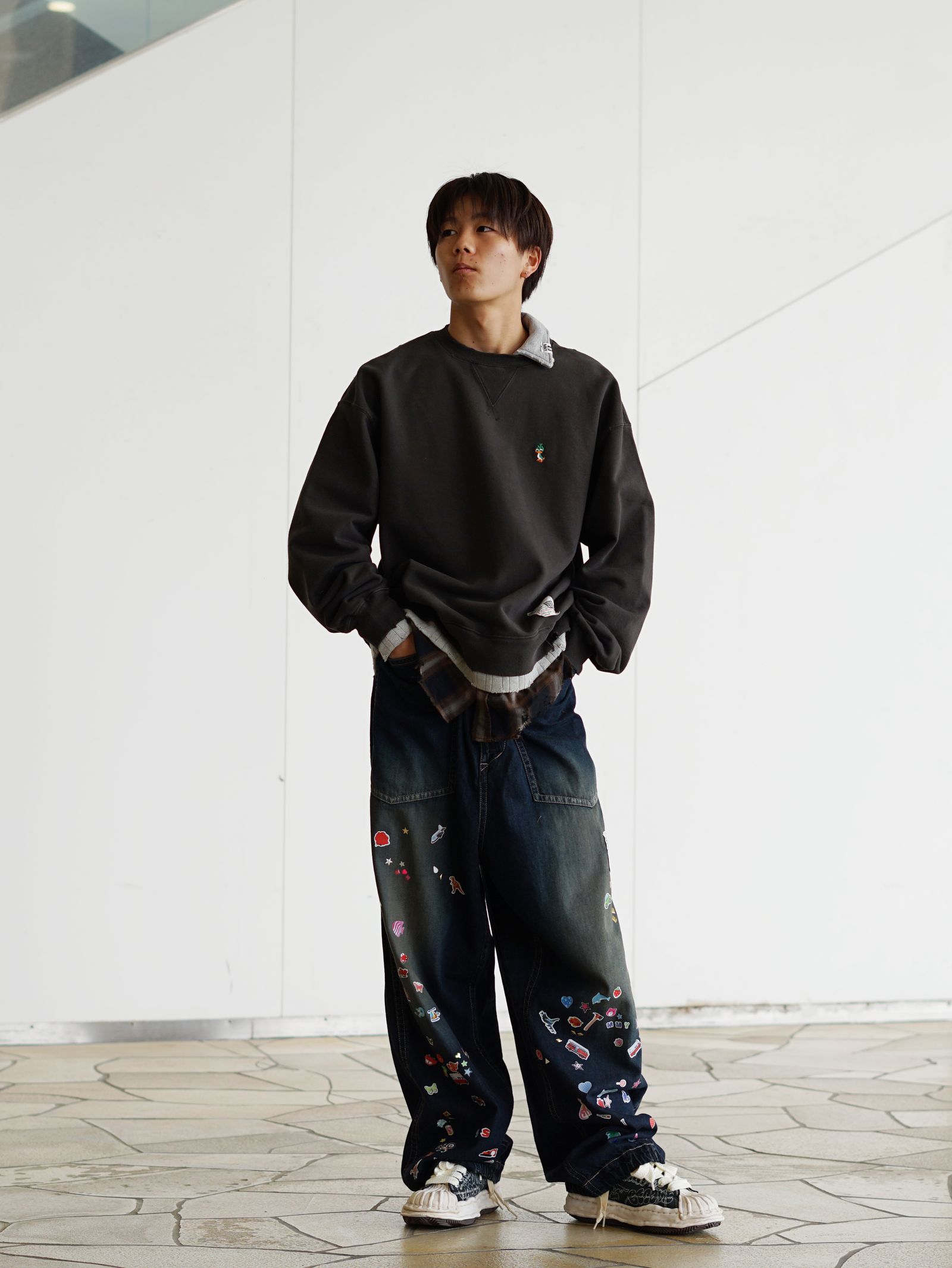 グラフィックデニムが主役の MMY26SS ストリートスタイル