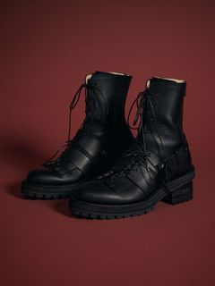 TVAのモードなボアベストをメインにしたレイヤードコーデ