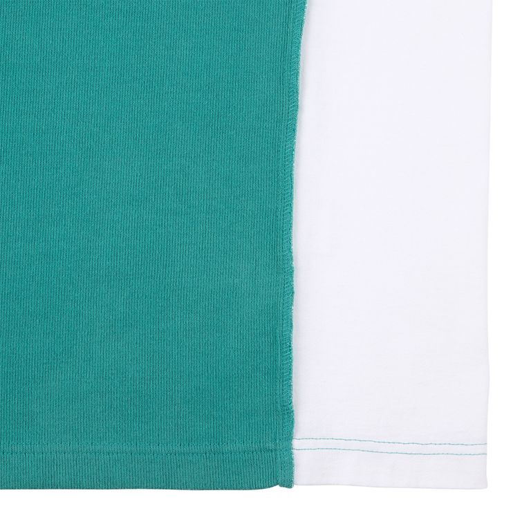 100%コットン。二重編み生地。クルーネック。プルオーバー。セットインスリーブ。後ろ身頃ショルダーに刺繍でCAV EMPT。左袖上部にシリコンパッチ。袖下、脇で色・生地切り替え。ワイドシルエット。ウォッシュ加工。日本製。