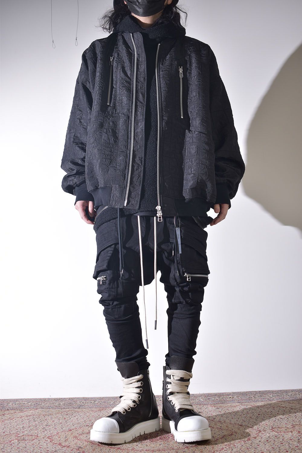 ニットフーディで保温性を確保