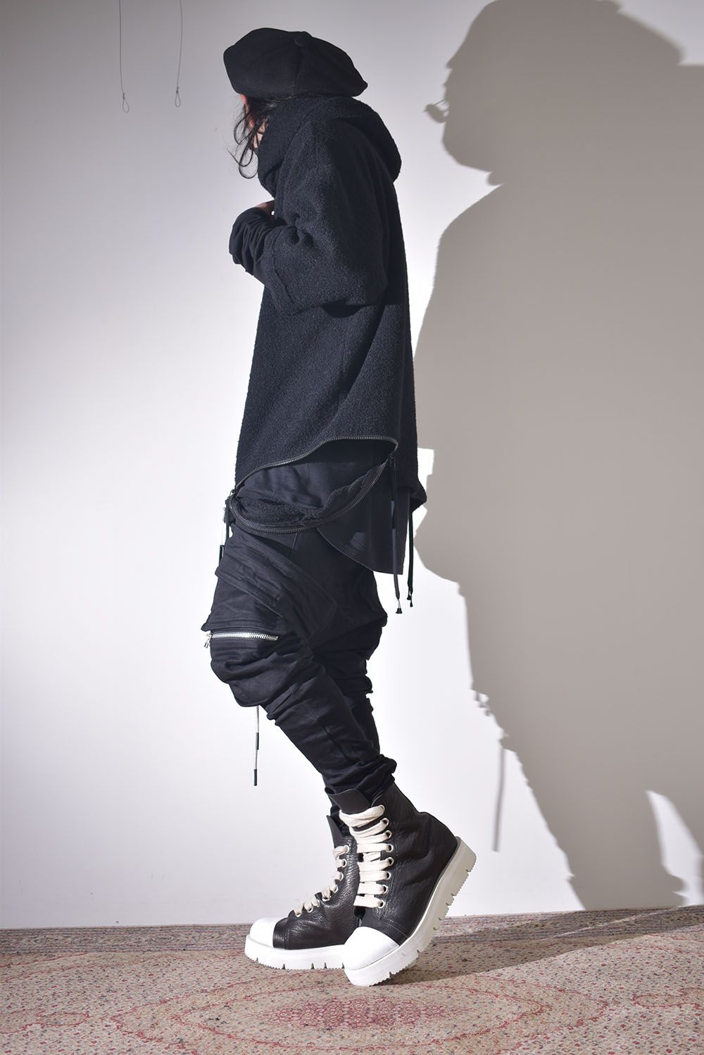 ニットフーディで保温性を確保