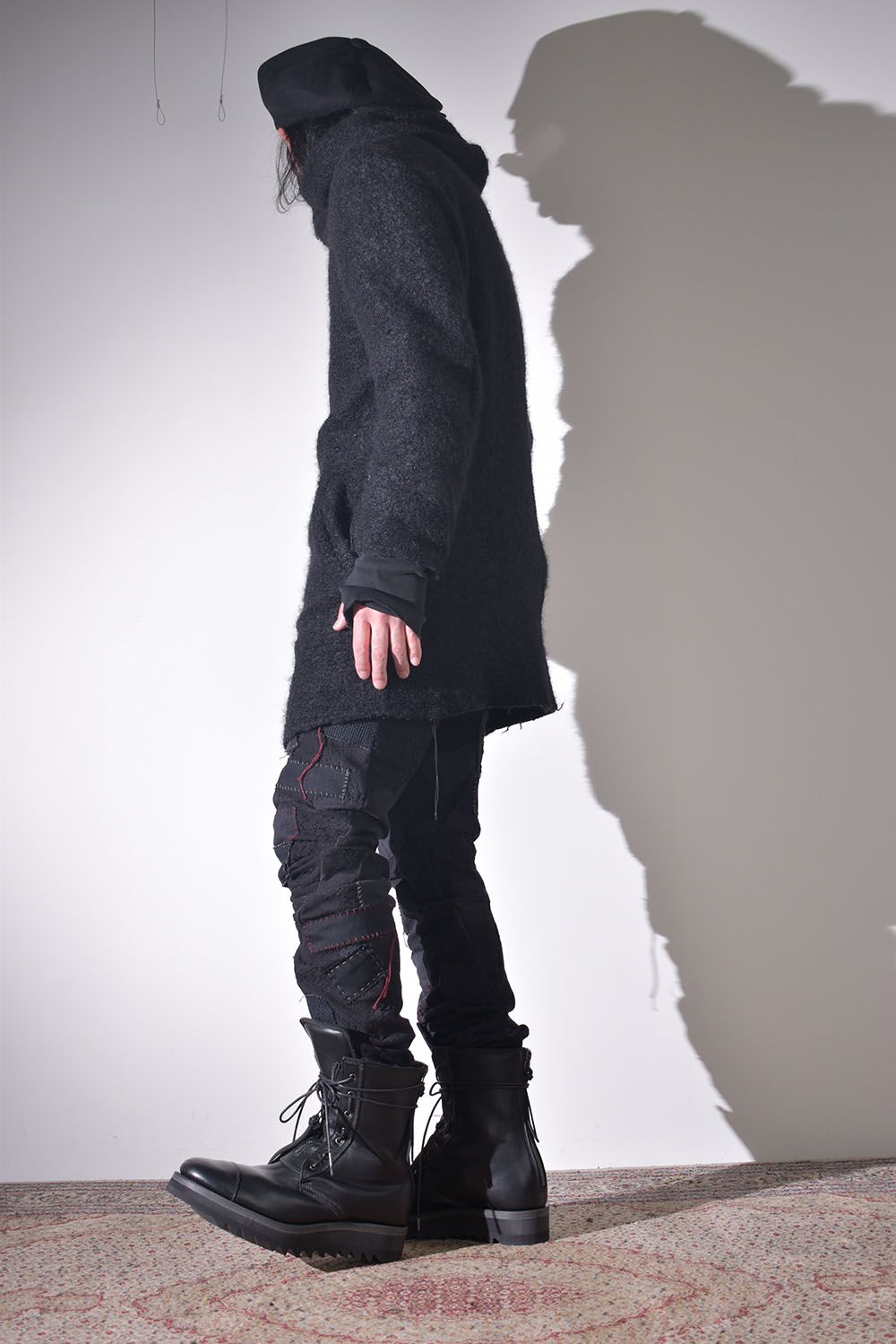 ライトアウターに保温性の高いフーディを差し込む