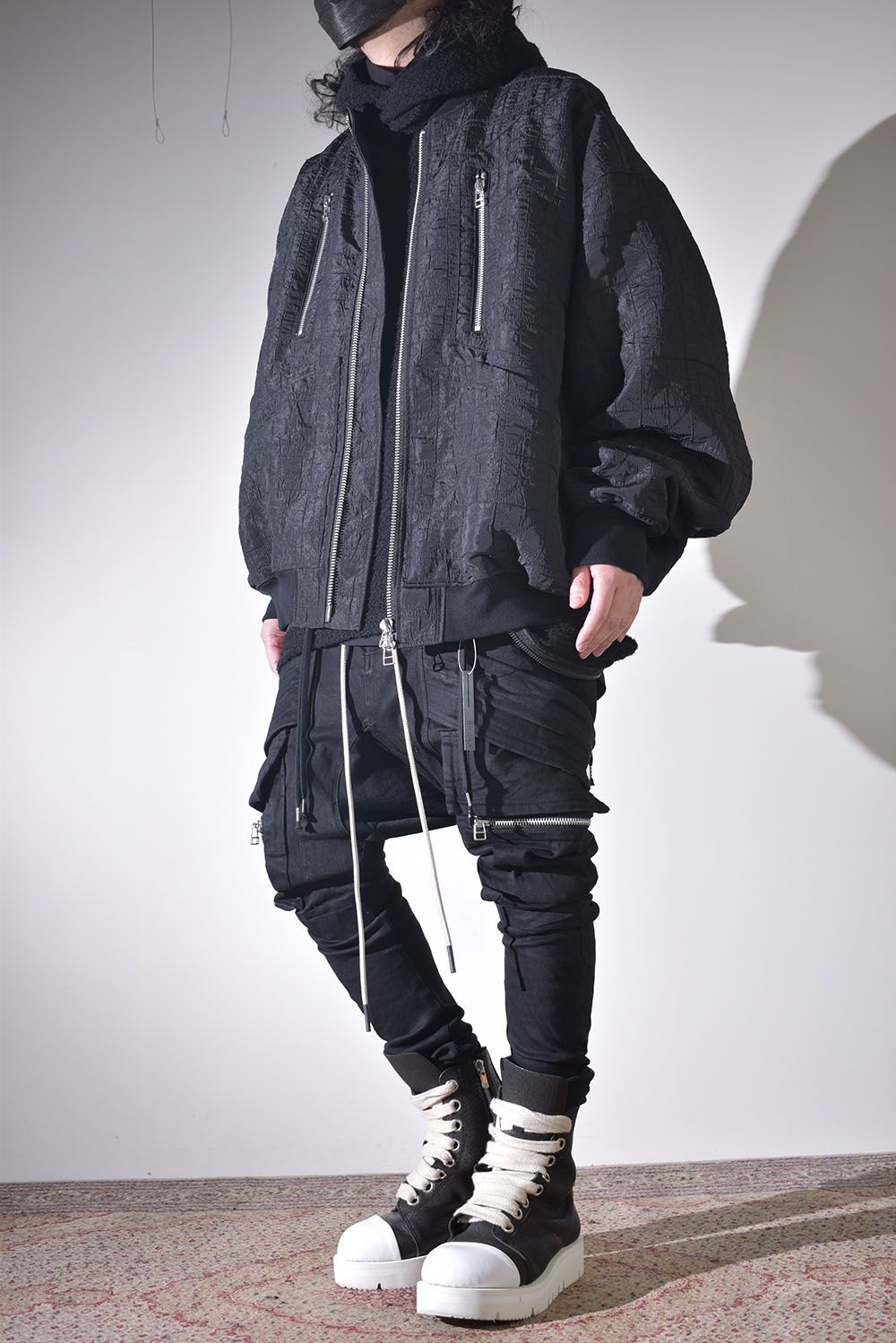 ニットフーディで保温性を確保