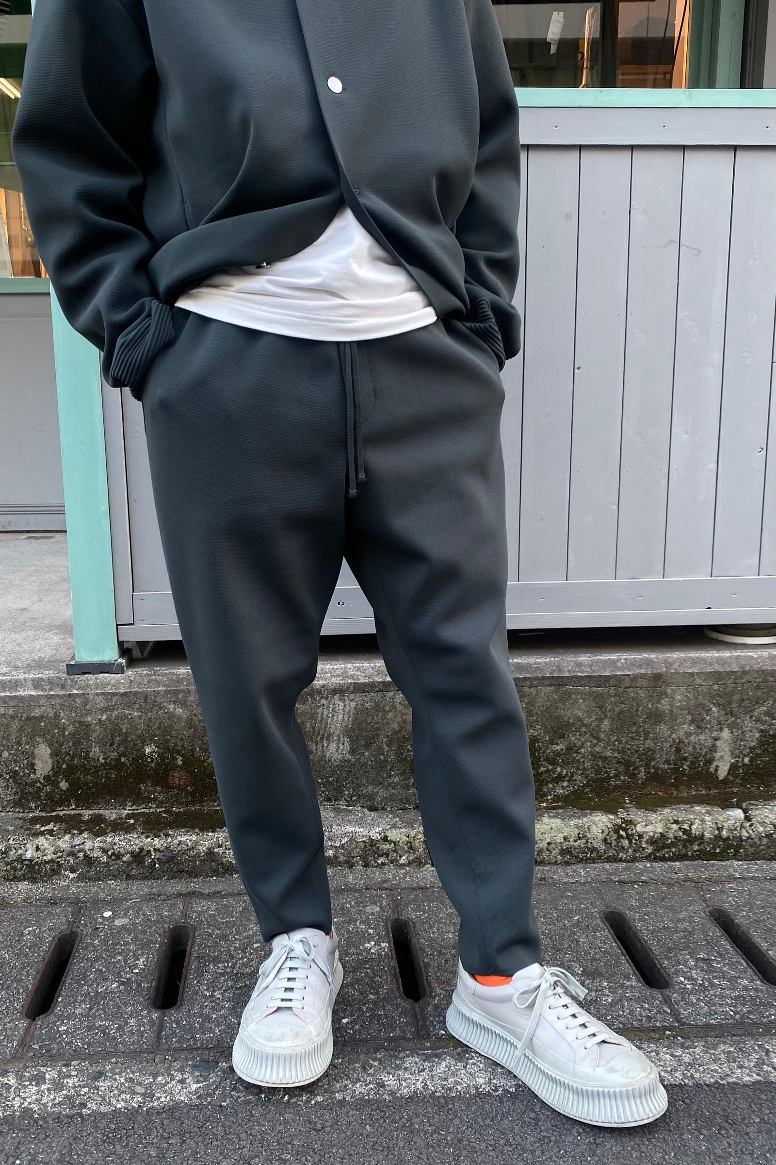 CFCL MILAN RIB TAPERED PANTS ブラック-