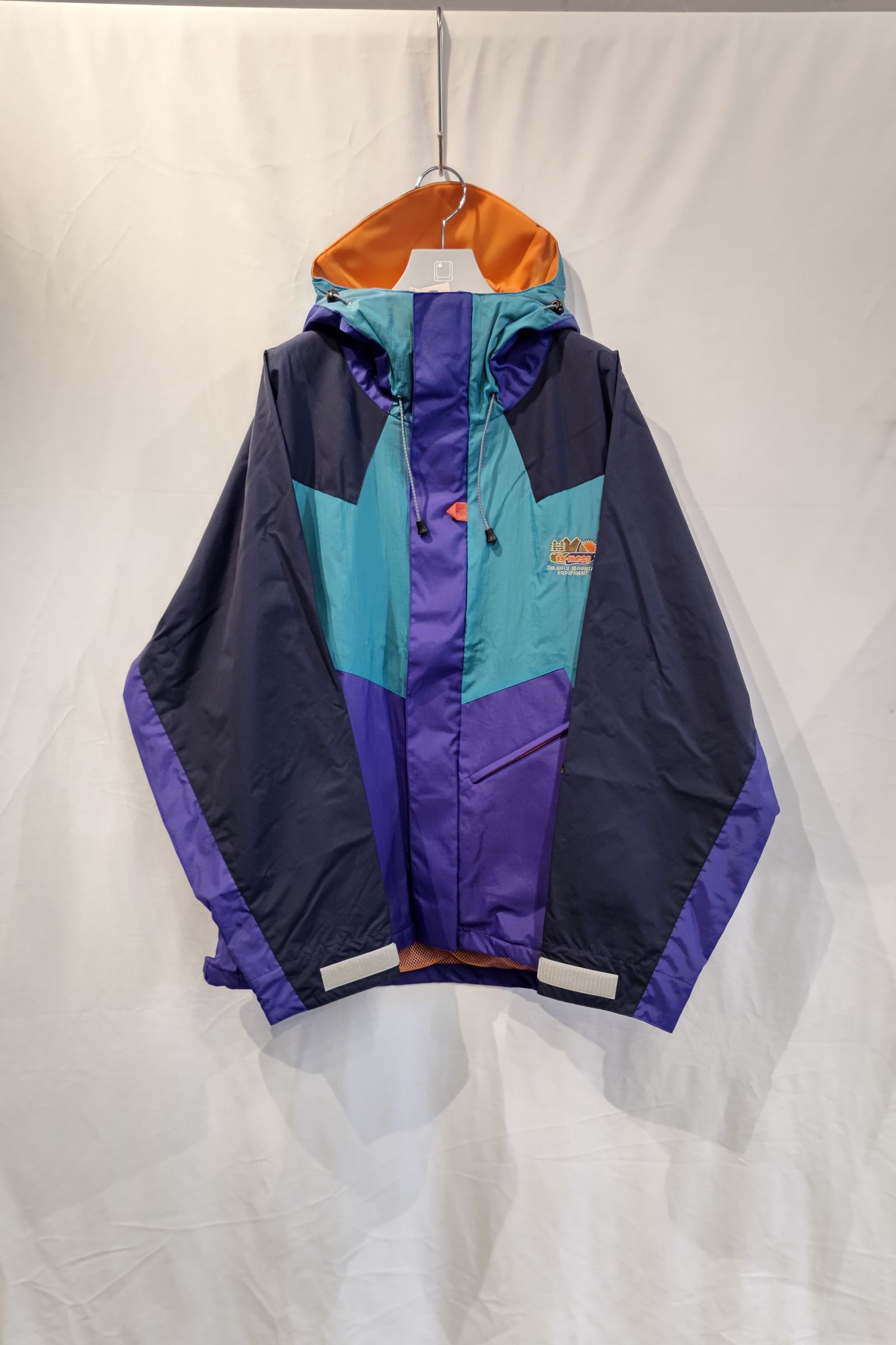 イズネス 23SS マウンテンパーカーPURPLE x BLUE-