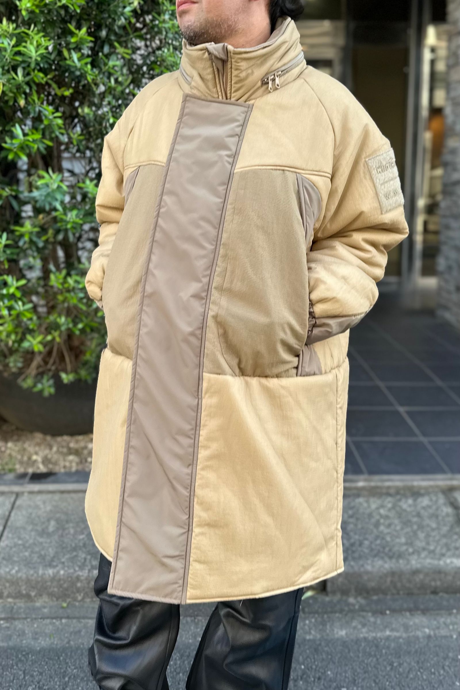 White Mountaineering - w.m.b.c × wild things primaloft monster