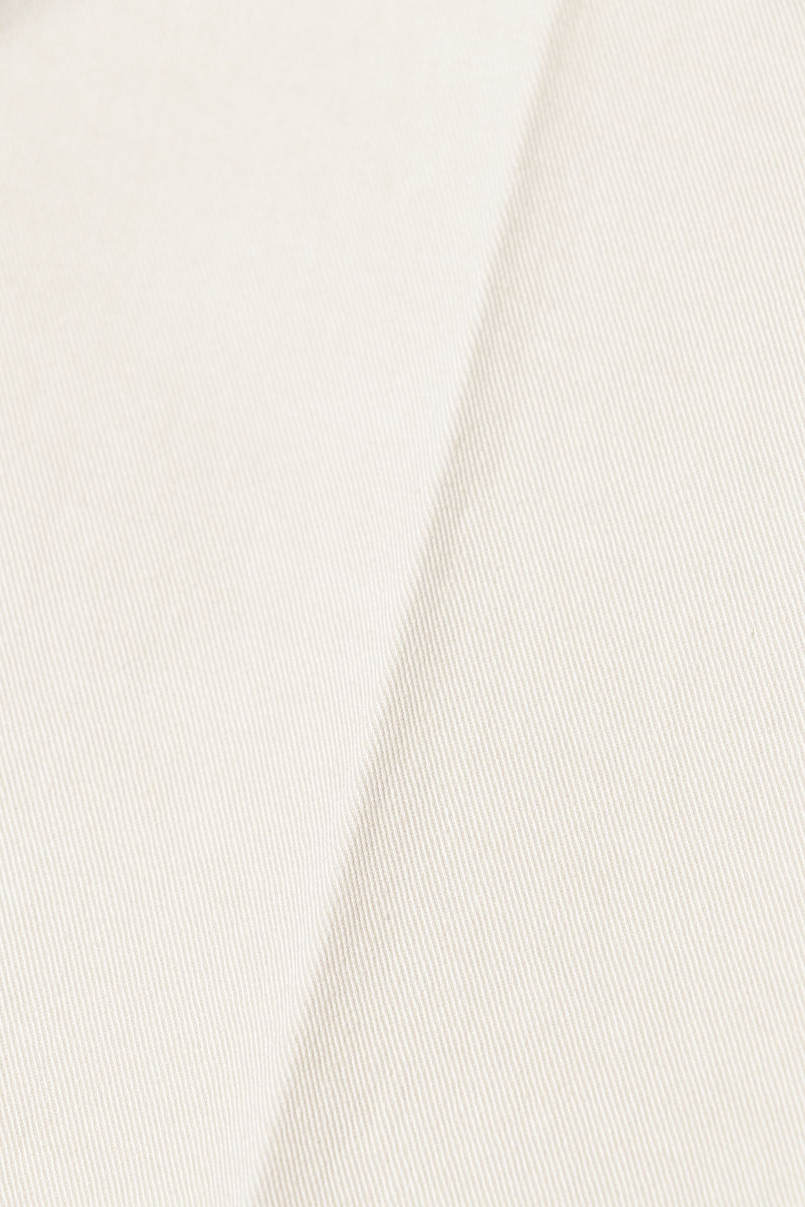 ALEXANDER コットンストレッチ ガーメントダイ スリムフィット チノ / STUCCO ベージュ