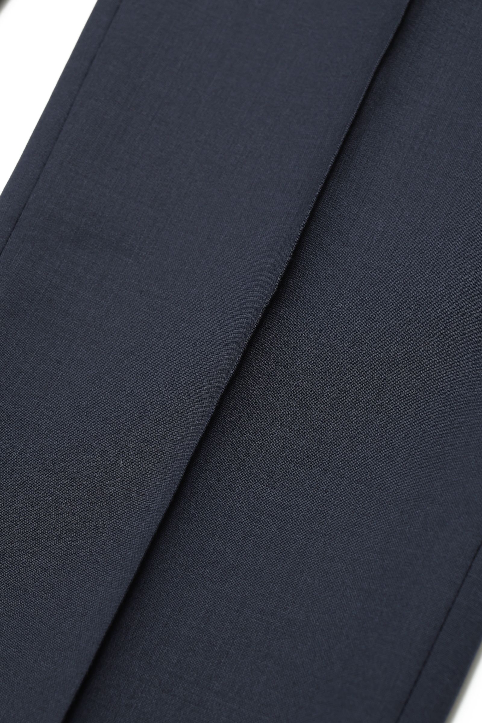 サイズ52まで【干場義雅氏 別注モデル】H DUE 永久クリース ストレッチウール パンツ / ネイビー