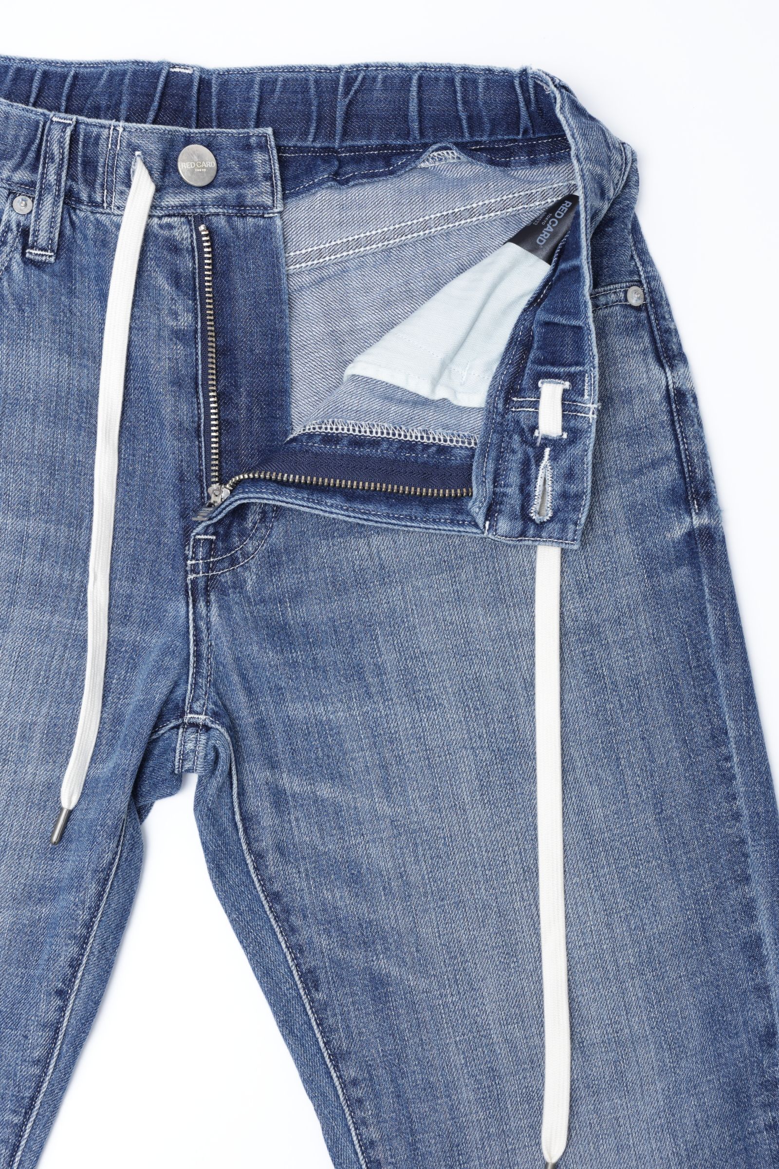 Rhythm+ Easy スリムテーパード シャーリング ハイパーストレッチ ライトオンス デニム / ミディアム インディゴ kita - Air Mid