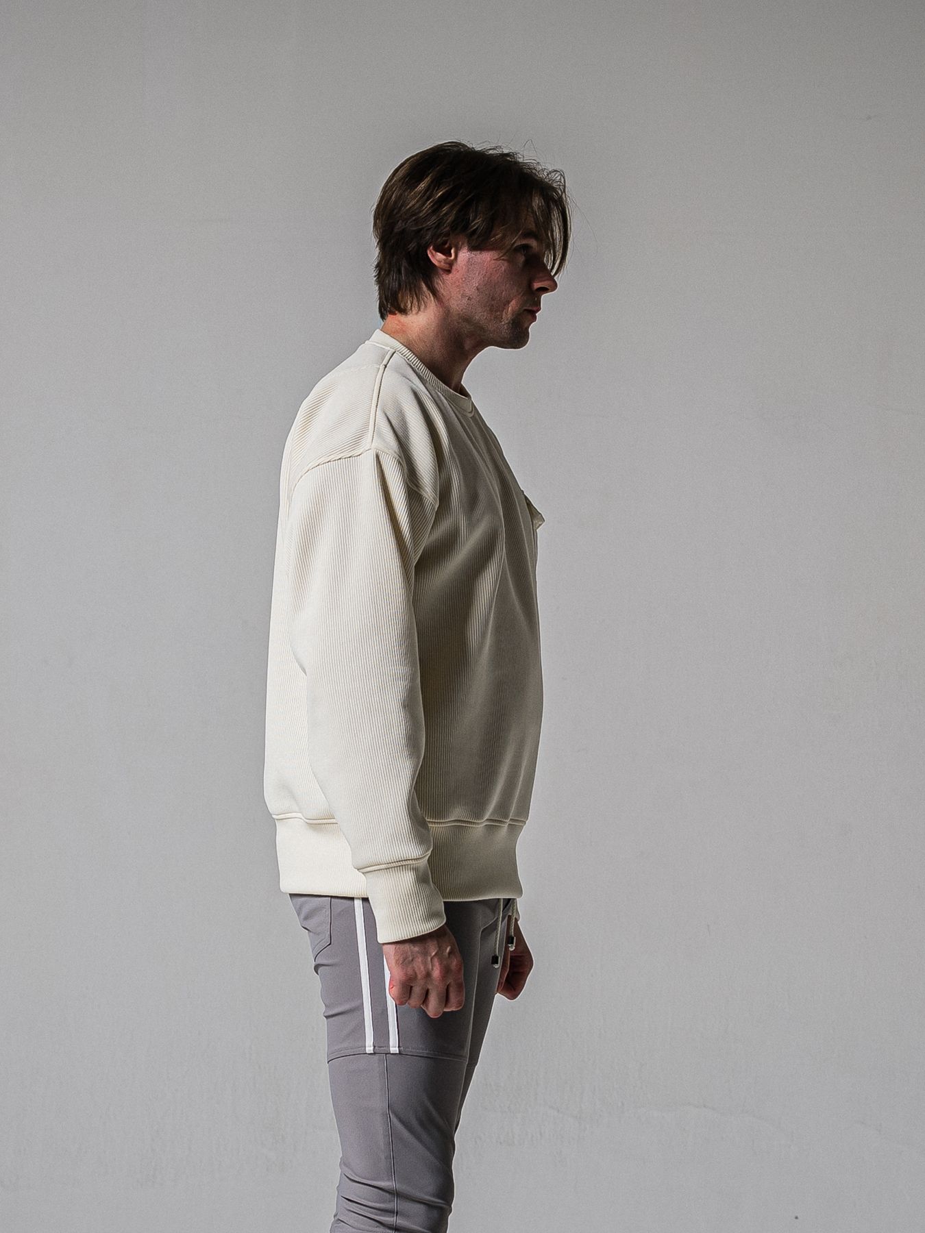 【予約品 11月16日(日) 締切】AZE MILITARY DROP TRAINER / 畔編みニット トレーナー / オフ