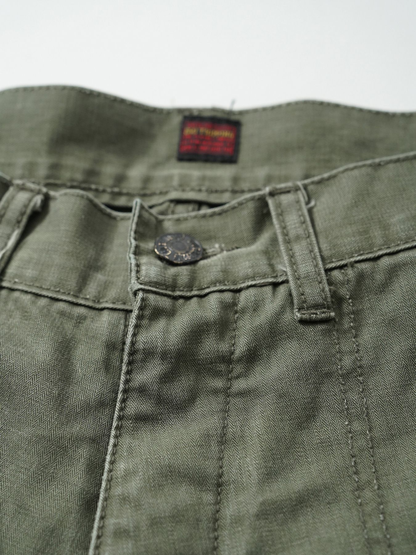 【予約品 5月6日(水) 締切】USN-MIRITARYHERRINGBONE aged / ユーズド加工 ミリタリーパンツ / カーキ