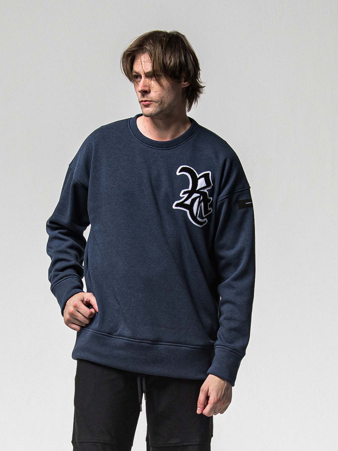 【予約品 8月31日(日) 締切】RC CHENILLE VELOURS FLEECE DROP TRAINER / RCサガラ刺繍ワッペン ベロアフリース ドロップショルダートレーナー / ネイビー