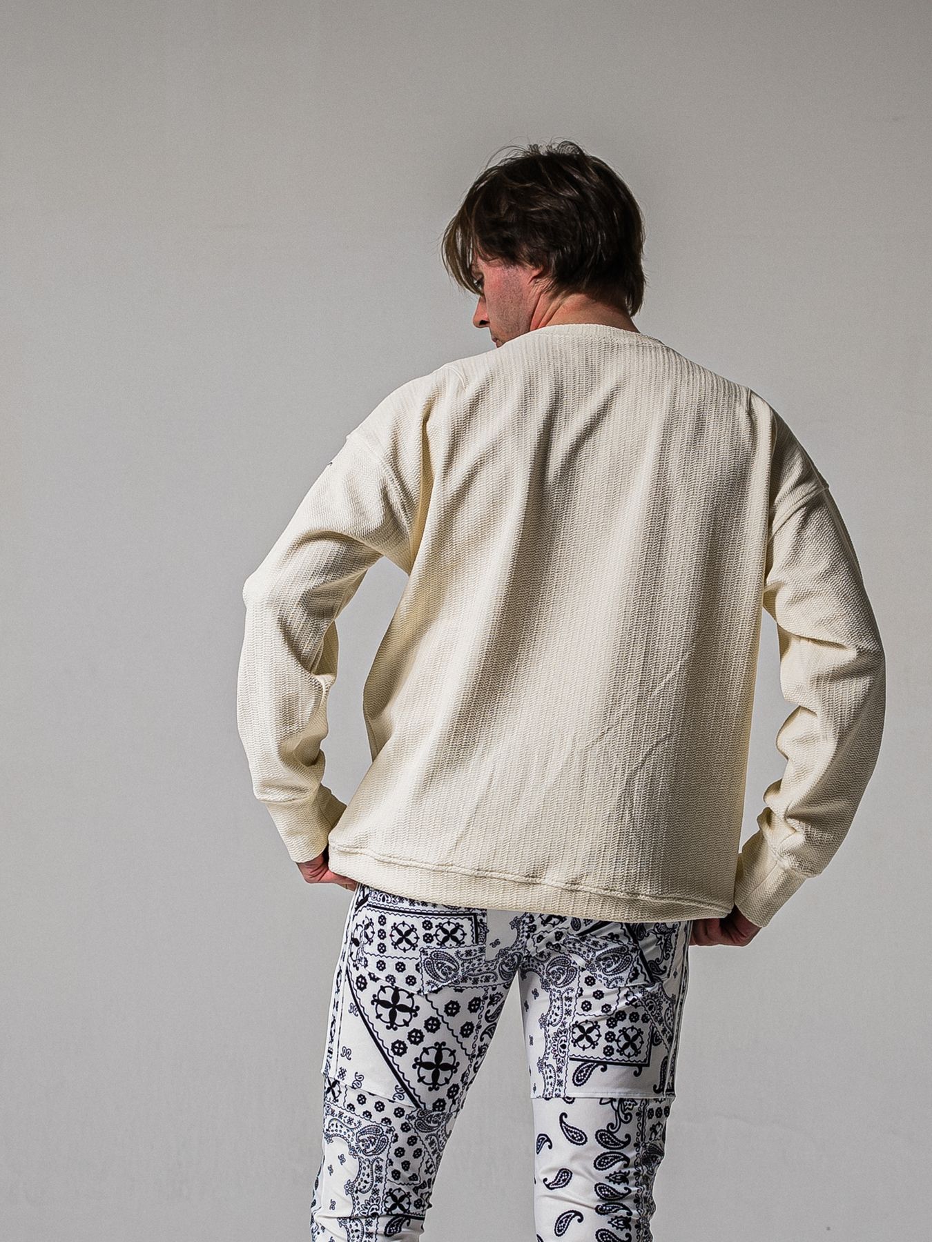 【予約品 11月16日(日) 締切】BLISTER TRAINER / ブリスターニット トレーナー  / オフ