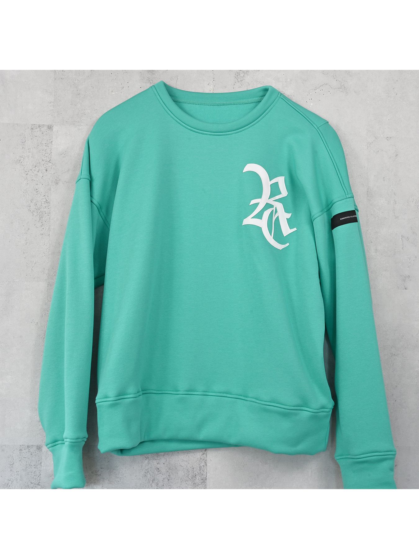 【予約品 9月6日(日) 締切】RC VELOURS FLEECE DROP TRAINER / RCレザーワッペン 裏起毛 ルーズトレーナー / ブルーグリーン