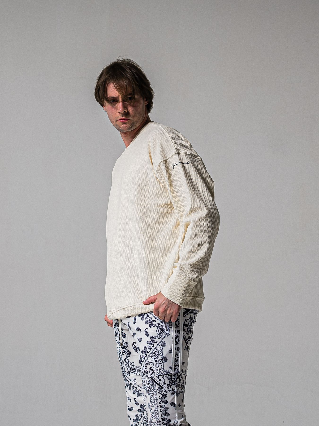 【予約品 11月16日(日) 締切】BLISTER TRAINER / ブリスターニット トレーナー  / オフ