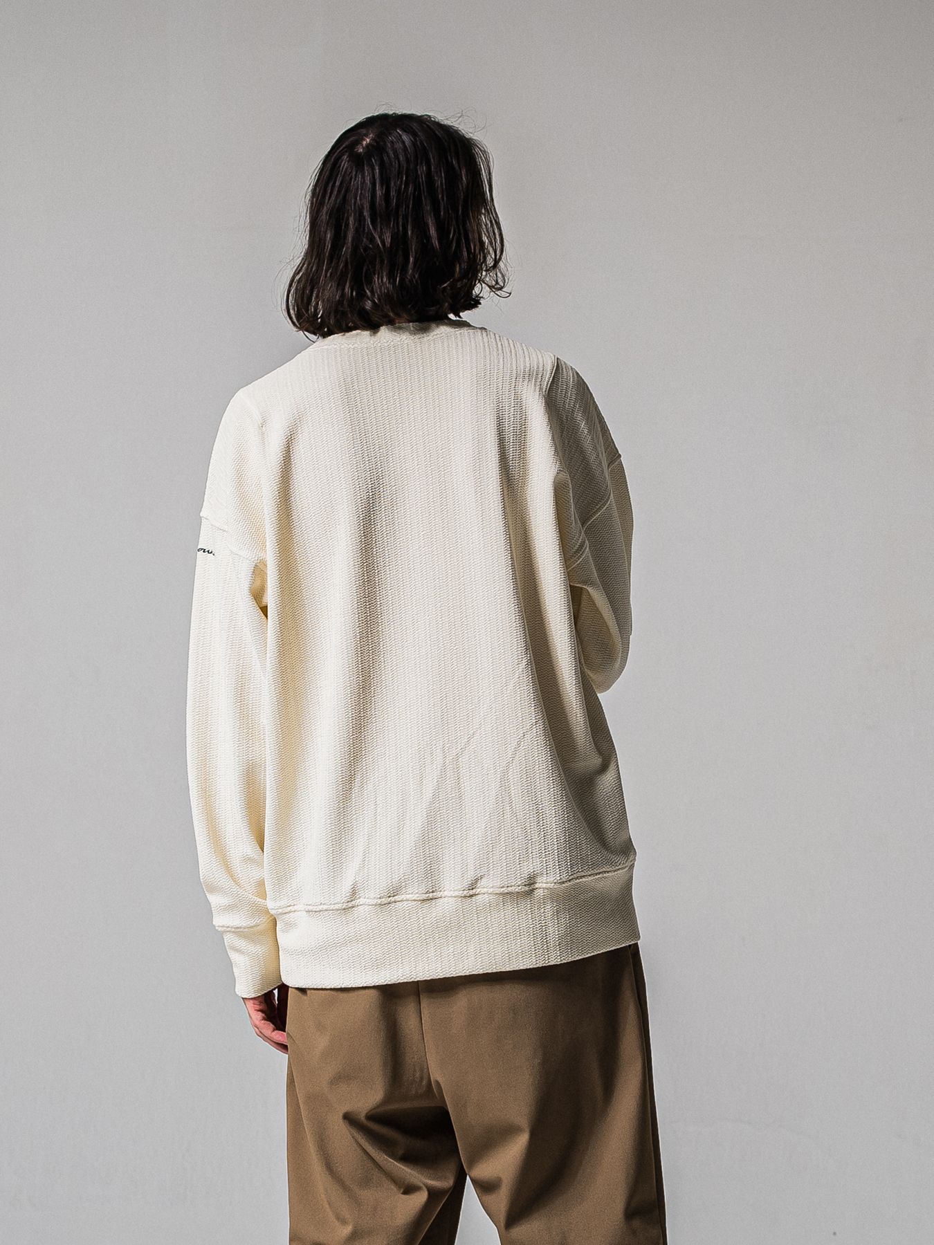 【予約品 11月16日(日) 締切】BLISTER TRAINER / ブリスターニット トレーナー  / オフ