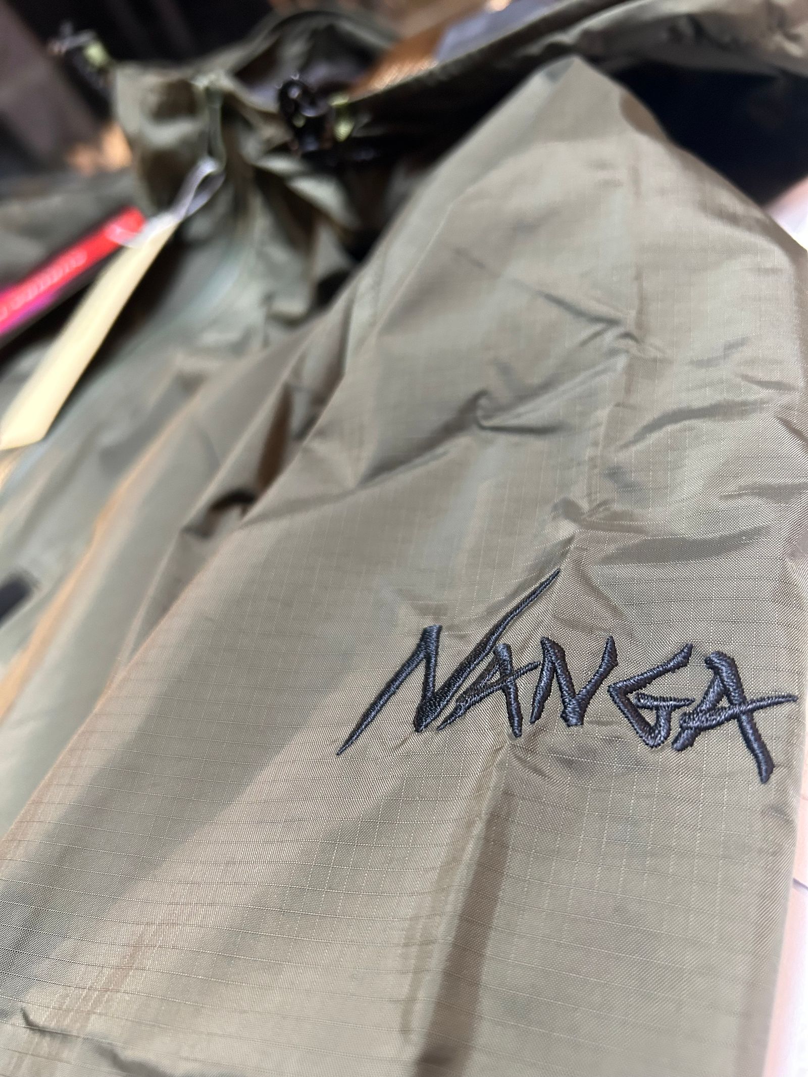 NANGA ×Grand PARK 別注オーロラシェルジャケット カーキ【Grand PARK】