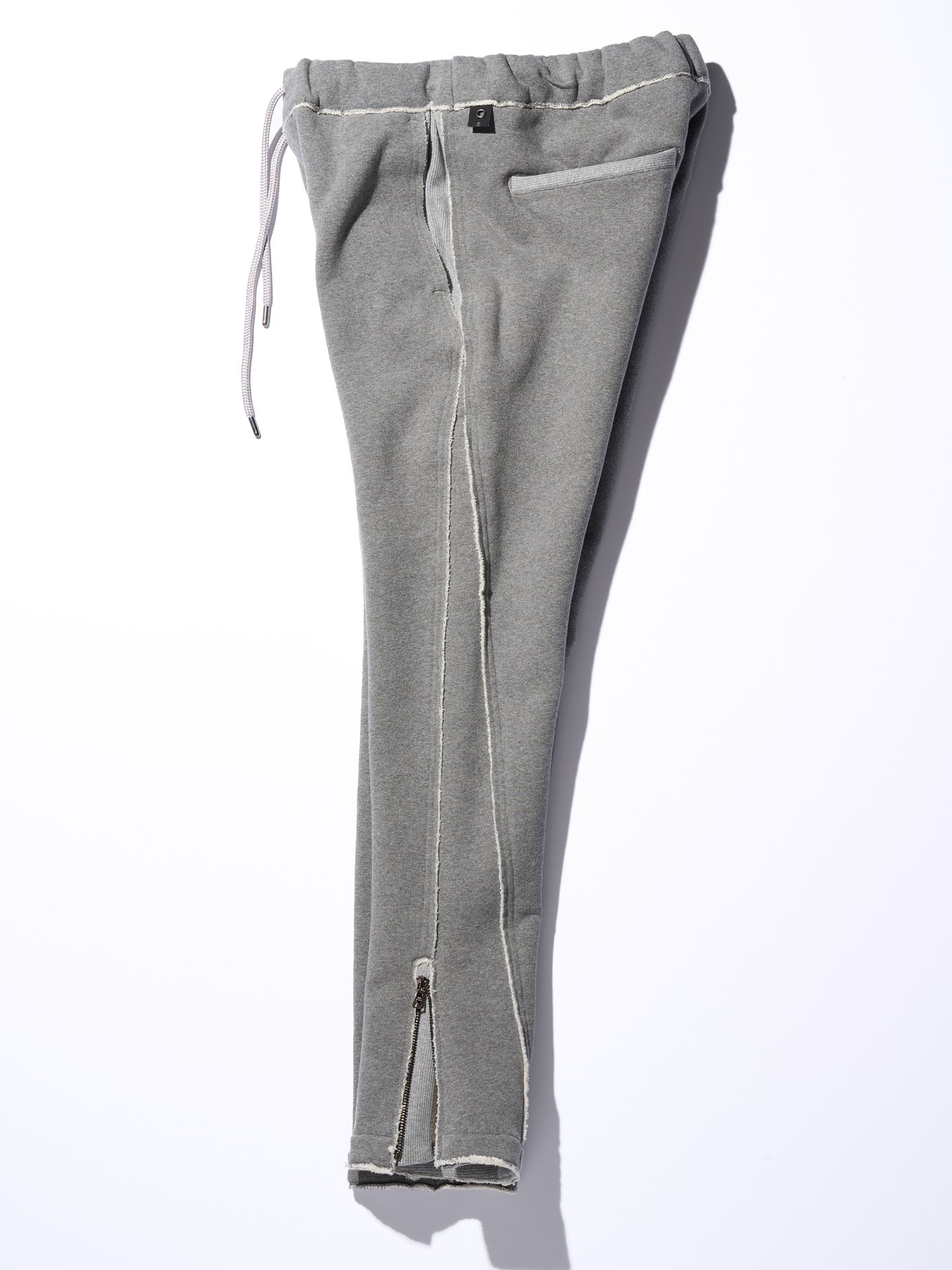 【予約品】 hem zip seam pants / スリムパンツ / グレー