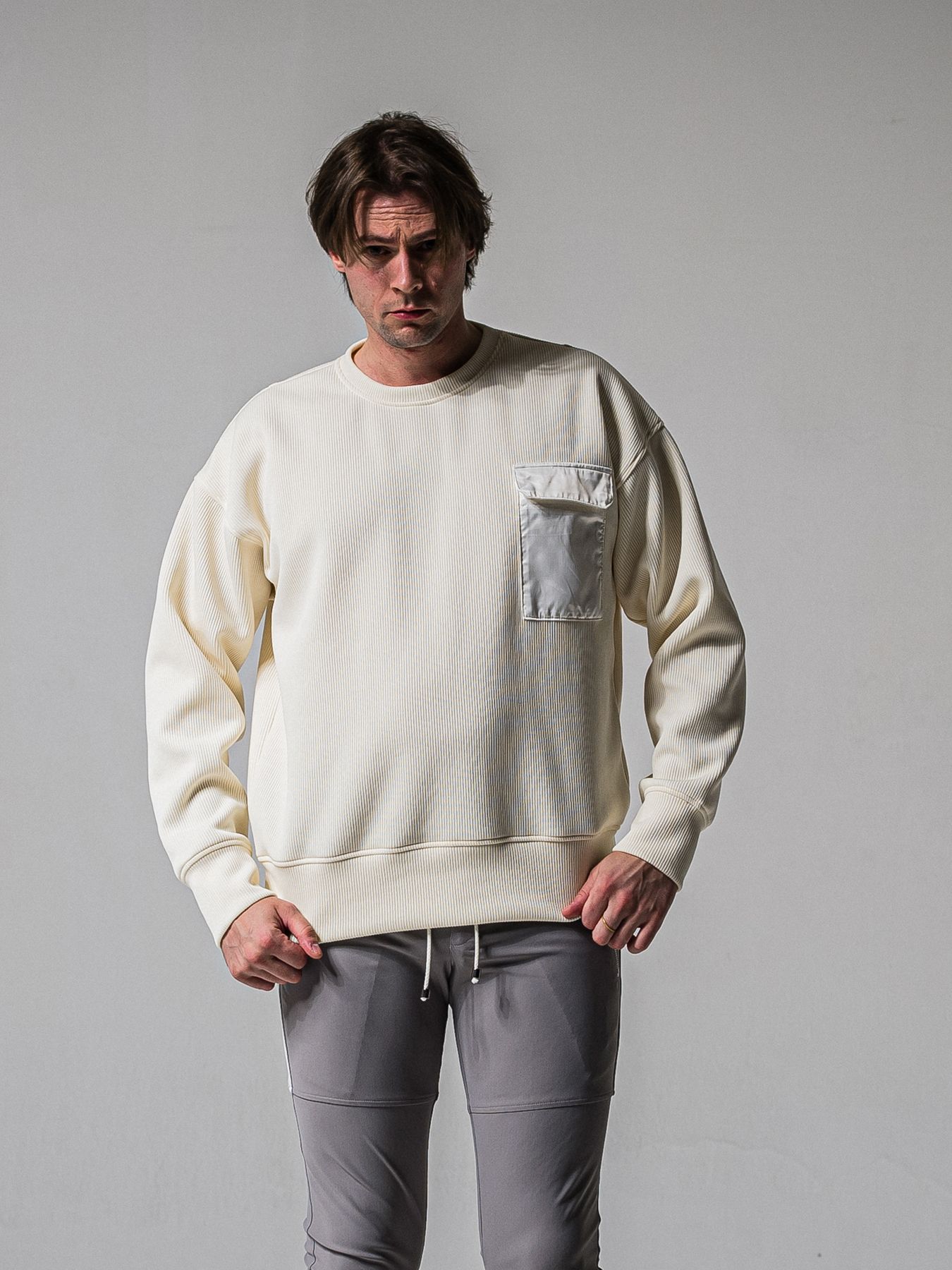 【予約品 11月16日(日) 締切】AZE MILITARY DROP TRAINER / 畔編みニット トレーナー / オフ