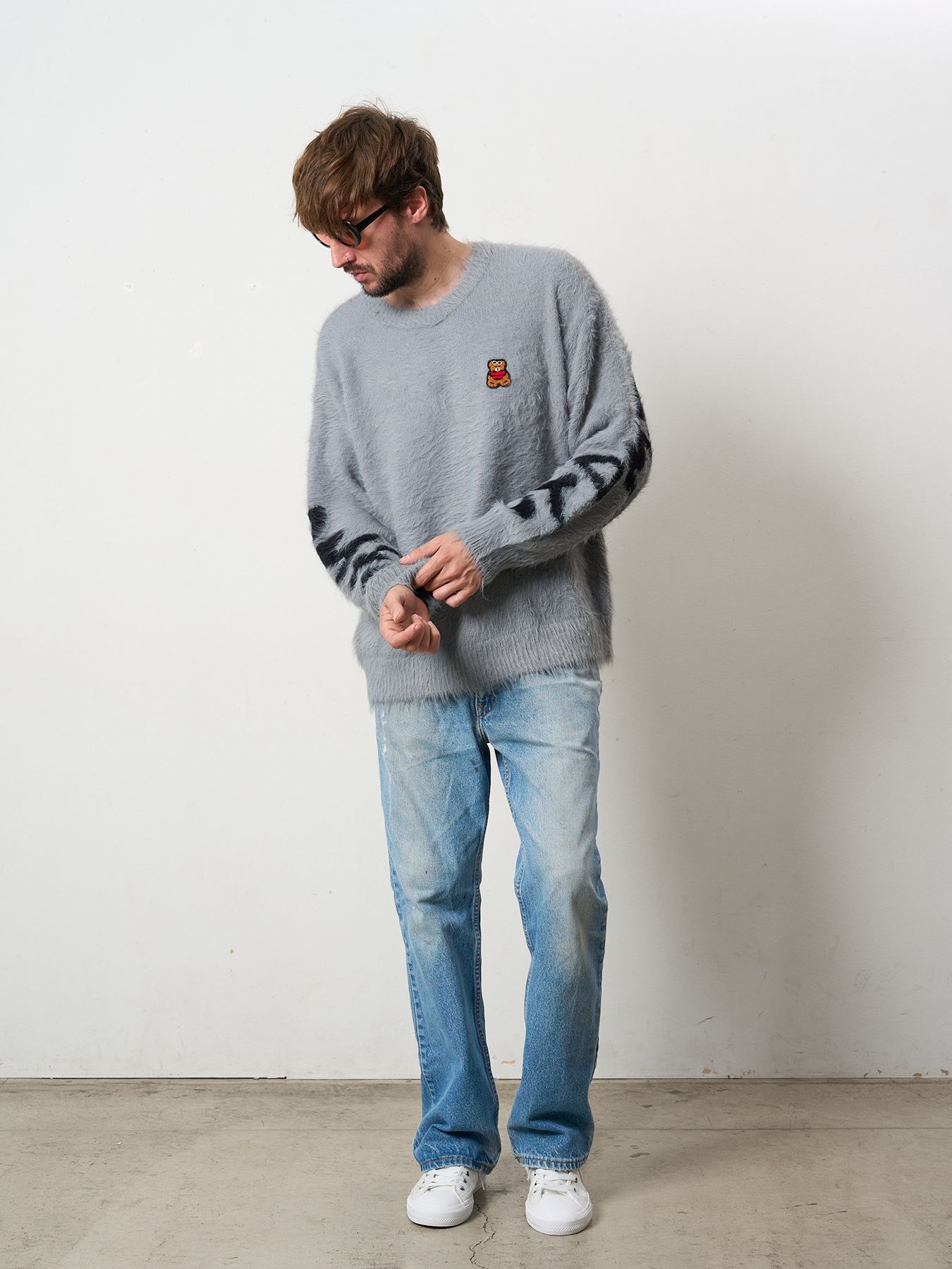 【予約品 5月8日(木) AM10時 締切】 ナイロンフェザーヤーン ビックロゴクロスインターシャシャギープルオーバー / M.グレー