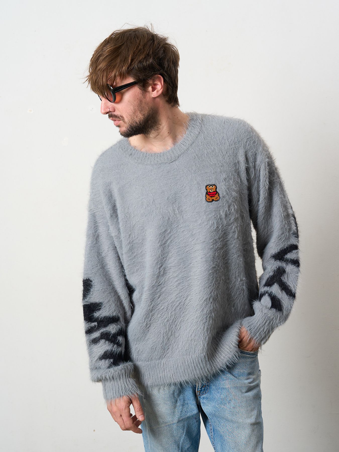 【予約品 5月8日(木) AM10時 締切】 ナイロンフェザーヤーン ビックロゴクロスインターシャシャギープルオーバー / M.グレー