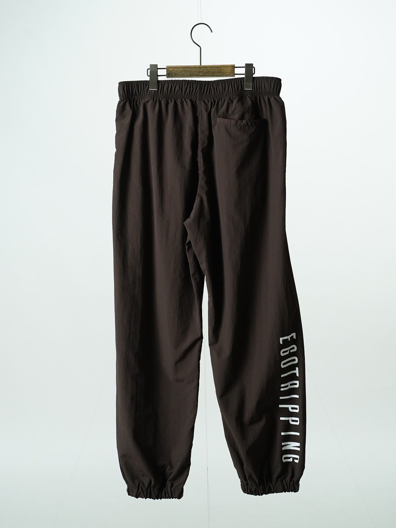 【予約品 7月5日(日) 締切】DAYGLYDE TRACKPANTS / ナイロンパンツ / ダークブラウン