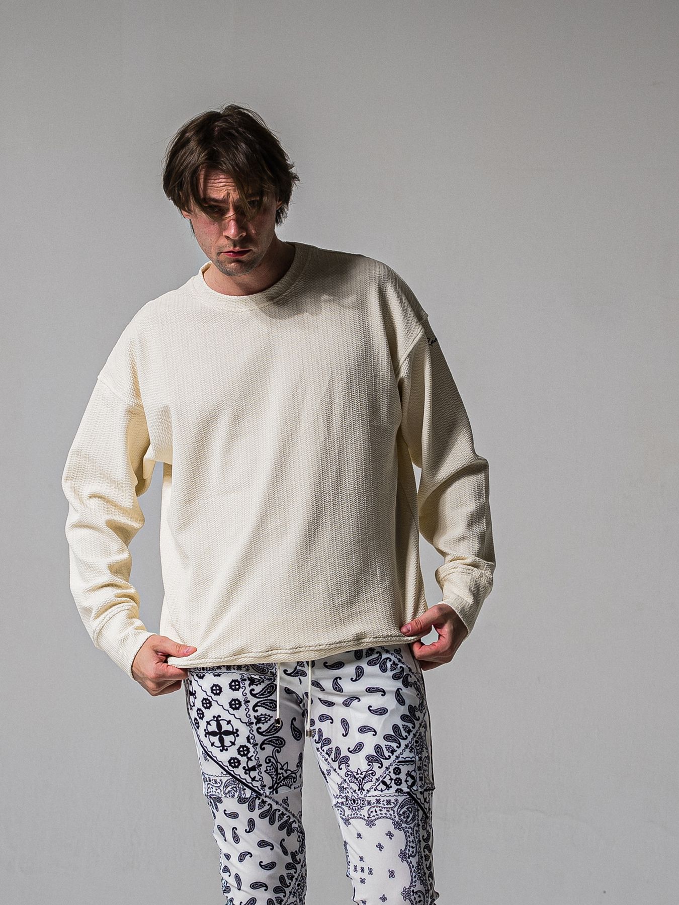 【予約品 11月16日(日) 締切】BLISTER TRAINER / ブリスターニット トレーナー  / オフ