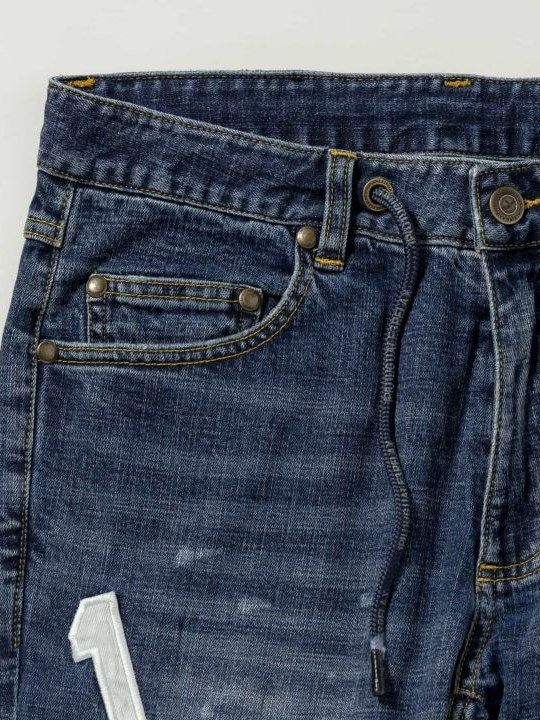 ロゴアップリケデニムパンツ インディゴ