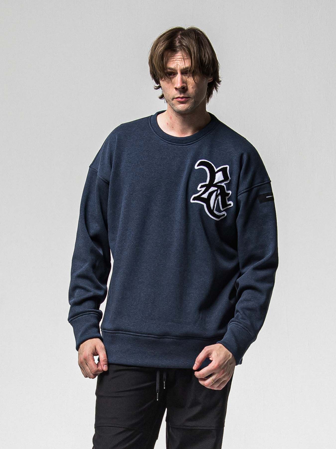 【予約品 8月31日(日) 締切】RC CHENILLE VELOURS FLEECE DROP TRAINER / RCサガラ刺繍ワッペン ベロアフリース ドロップショルダートレーナー / ネイビー