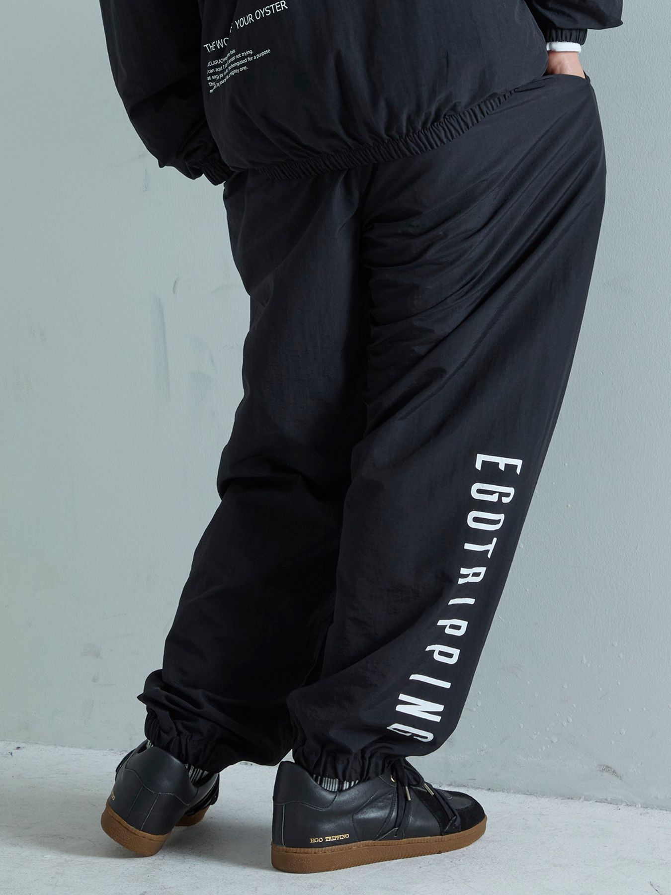 【予約品 7月5日(日) 締切】DAYGLYDE TRACKPANTS / ナイロンパンツ / ブラック