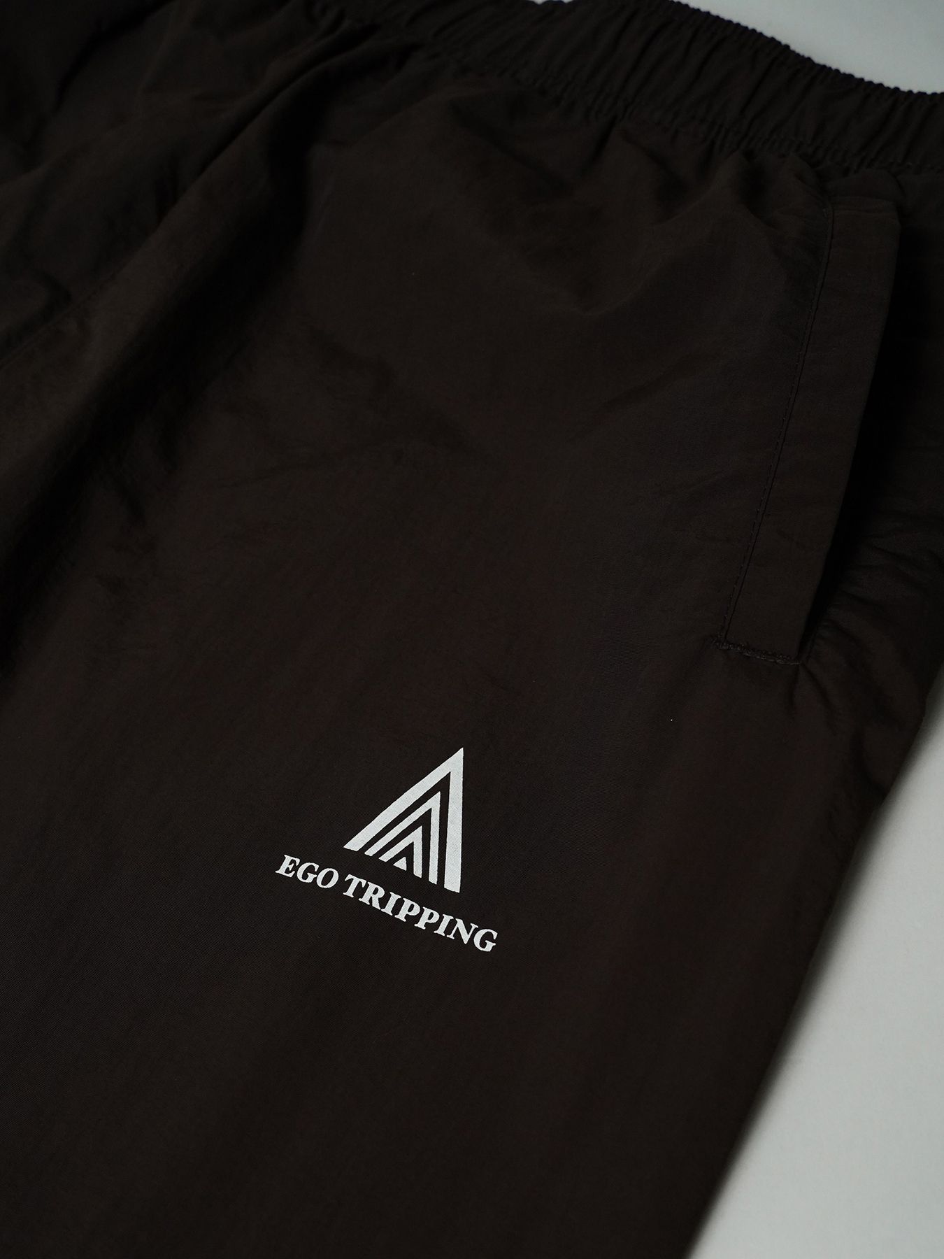 【予約品 7月5日(日) 締切】DAYGLYDE TRACKPANTS / ナイロンパンツ / ダークブラウン